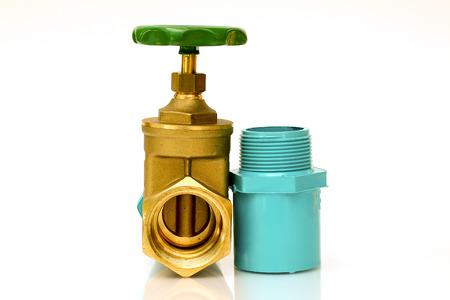 Valve - Turn off the water blond joints PVC white background.