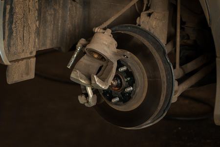 Repair Brake, Brake disk and caliper assembly on a modern car about to be replacedの写真素材