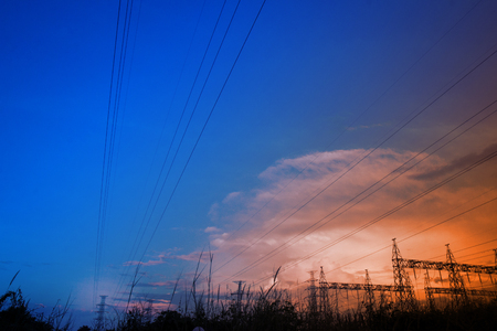 Electricity power station,Power distribution system to sunset sky background.の写真素材
