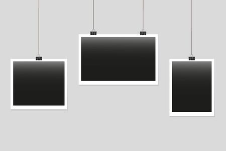 Photo frames isolated on the grey background. Picture and foto frame hanging on a clips. Blank photos frames hanged on wall for memory. Vintage snapshots with clips. Album painting images. Vector.のイラスト素材