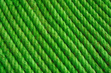Background texture green stucture wall ropeの写真素材
