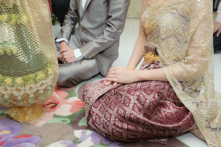 Worship hands ring wedding thai clothing married closeupの写真素材