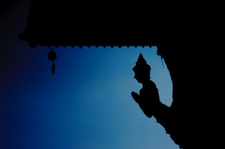 Silhouette gold Sculpture of temple in Thailandの写真素材