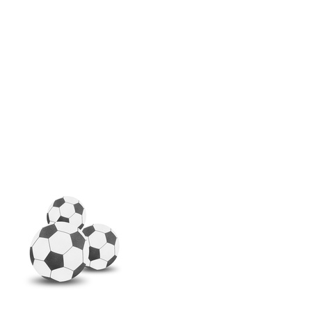 Football soccer ball craft by cork board on white isolateの写真素材
