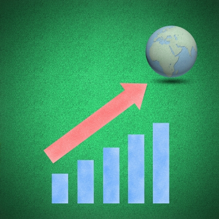 Arrow graph increase globes concept on green background by cork boardの写真素材