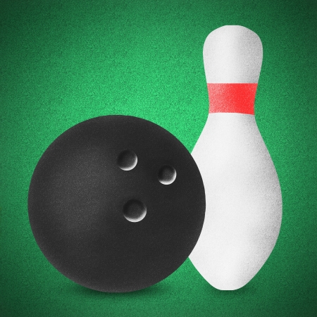Bowling sport craft on green grass by cork boardの写真素材