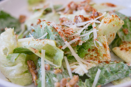 Caesar salad closeup on top of a tableの写真素材