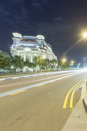 Singapore, Singapore - May 7, 2014: The Fullerton Hotel Singapore at bluehour. It's a five-star luxury hotel and One Fullerton building, it's a waterfront dining.のeditorial素材