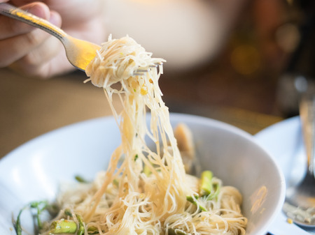 asian fried rice vermicelli with vegetables noodle on a bowlの写真素材