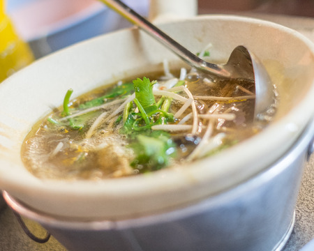 Fish maw braised crab mushroom pork in bowl