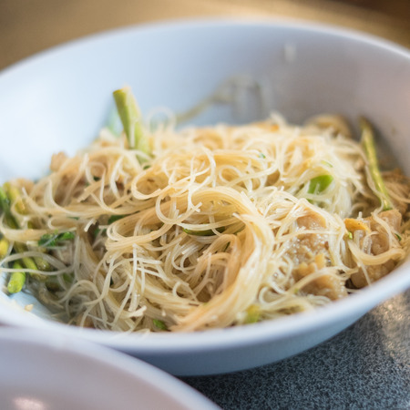 asian fried rice vermicelli with vegetables noodle on a bowlの写真素材