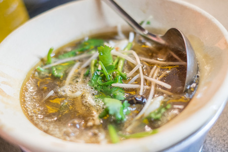 Fish maw braised crab mushroom pork in bowlの写真素材