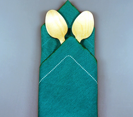 Wood spoons on the napkinの写真素材