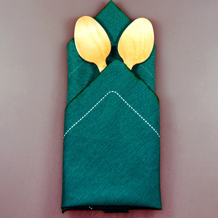 Wood spoons on the napkinの写真素材