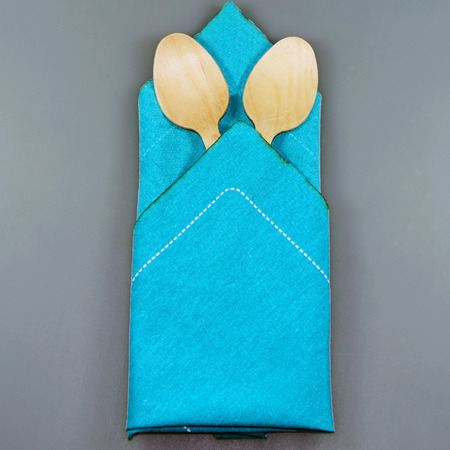 Wood spoons on the napkinの写真素材