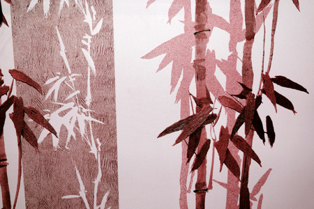 Bamboo stalks and reds in silhouetteの写真素材
