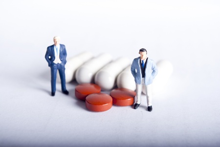 two man with pils or drugsの写真素材