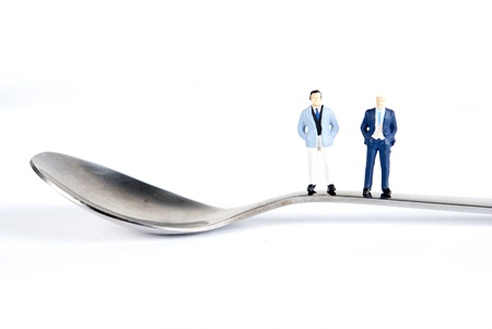 two mens on tea spoonの写真素材