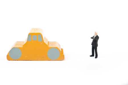 one man on car on whiteの写真素材