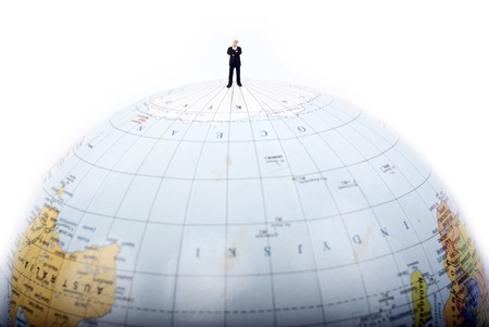 business man standing on earthの写真素材