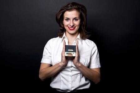 woman with miniature house