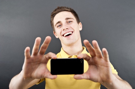 man holding mobile phone