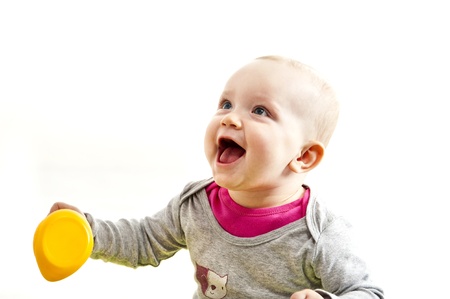 baby smiling and looking aheadの写真素材