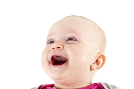 baby smiling and looking up