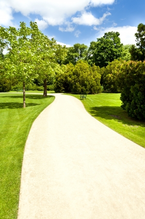 armchair in park with roadの写真素材