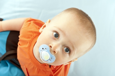 baby on white background look upの写真素材