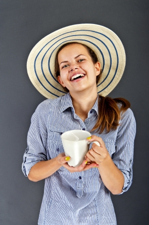 Woman with coffee cupの写真素材