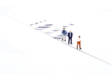 Miniature people on white backgroundの写真素材