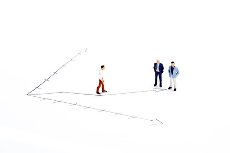 Miniature people on white backgroundの写真素材