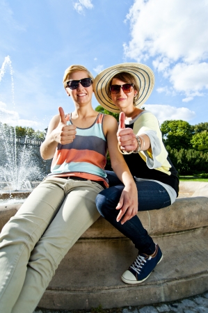Travel two woman and sideseeing foutainの写真素材