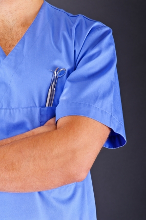 Dentist doctor over dark backgroundの写真素材