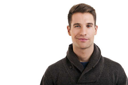 Portrait of attractive male in casual clothes looking at camera with smileの写真素材
