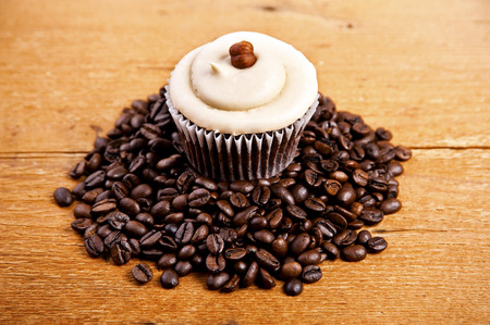 chocolate cupcake on old wooden tableの写真素材