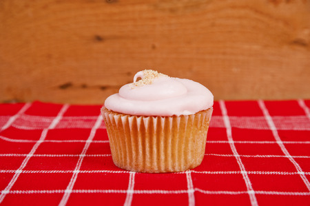cupcakes on wooden backgroundの写真素材