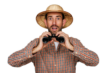 Man with binoculars, travel wow sign isolated over white background.の写真素材