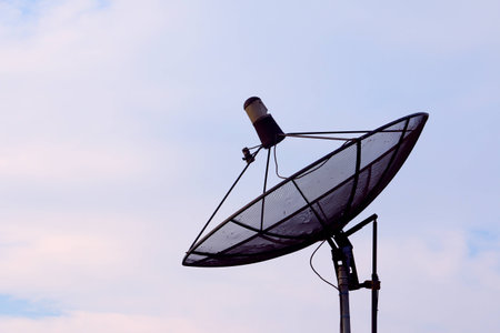 satellite dish antennas under skyの写真素材