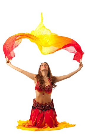 young woman dance with fantail in traditional indian costumeの写真素材
