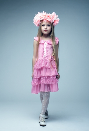 Studio portrait of beautiful blonde girl  Isolated on whiteの写真素材