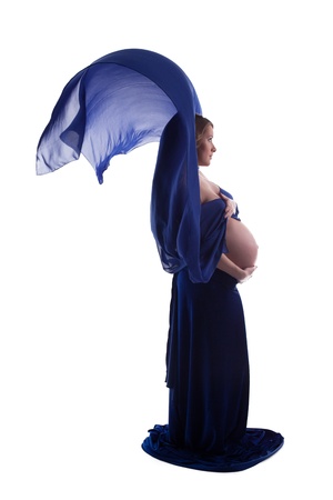 Profile of charming pregnant woman with blue veil, isolated on whiteの写真素材