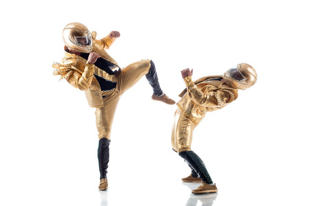 Image of young strippers fighting in studio, isolated on white