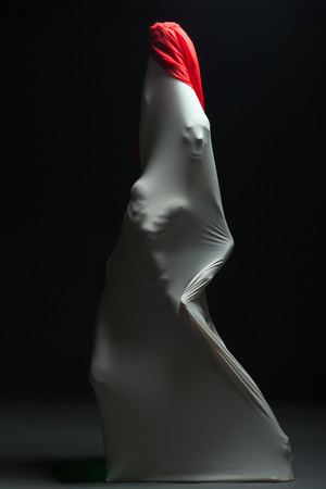 Metaphor for internal struggle - faceless female silhouetteの写真素材