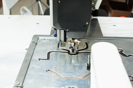 Image of sewing machine stitching on patterns, close-upの写真素材