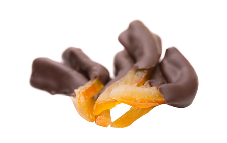 Image of orange slices in dark chocolate, close-upの写真素材