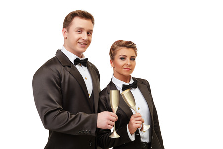 Corporate party. Colleagues clink glasses, isolated on white