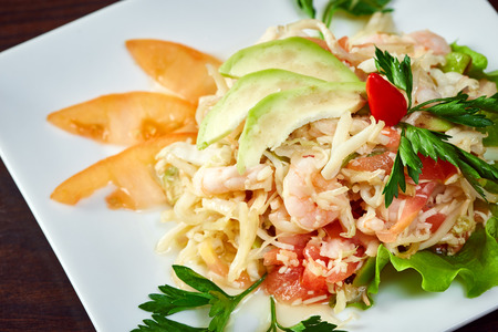 Mouthwatering salad of shrimp and fresh vegetables, close-upの写真素材