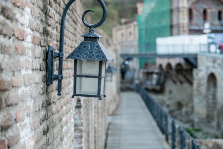 Close-up of lantern on brick wall. Tbilisi, Georgiaの写真素材